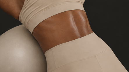 Close-up of an athlete's midsection in neutral training wear